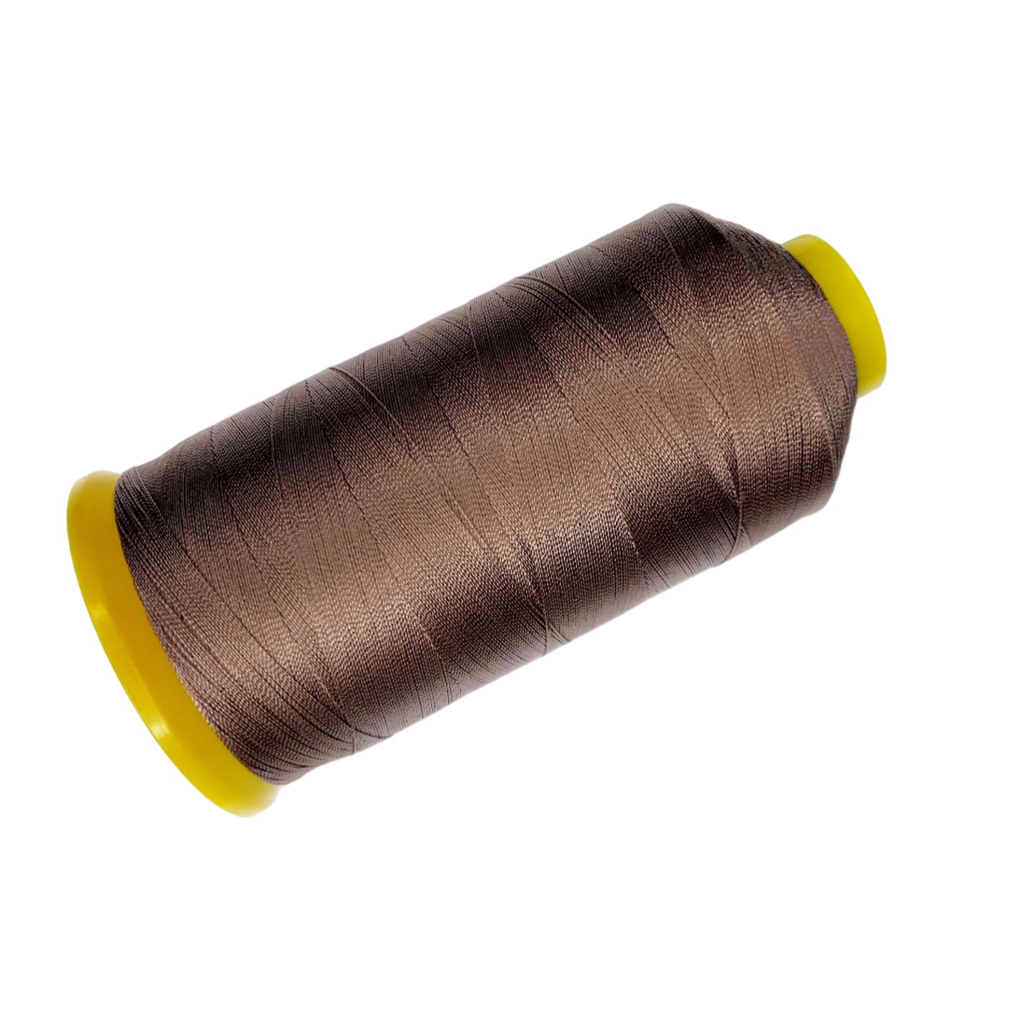 Spool of brown thread with a yellow core on a white background