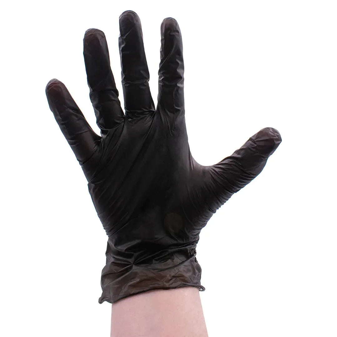 Model wears Colortrak Black Vinyl Glove.