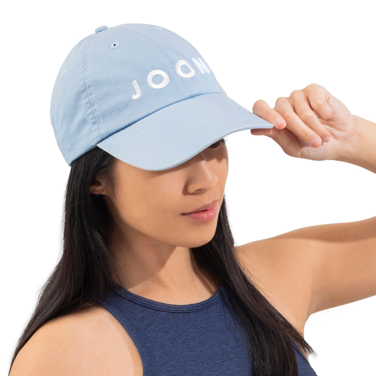 Model wears JOON cap.