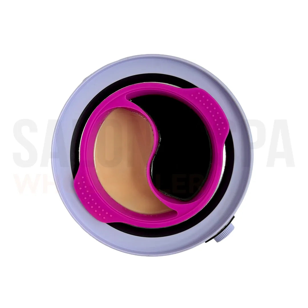 Overhead view of the 400 gram NudeU Dual Pot Reusable Silicone Liner in a wax warmer.