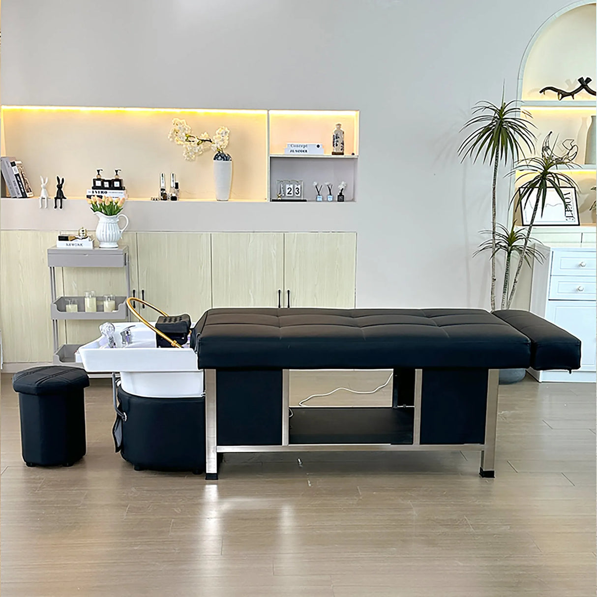 Lifestyle image of the black SSW 611-1D Fresh Water Japanese Head Spa Massage Bed