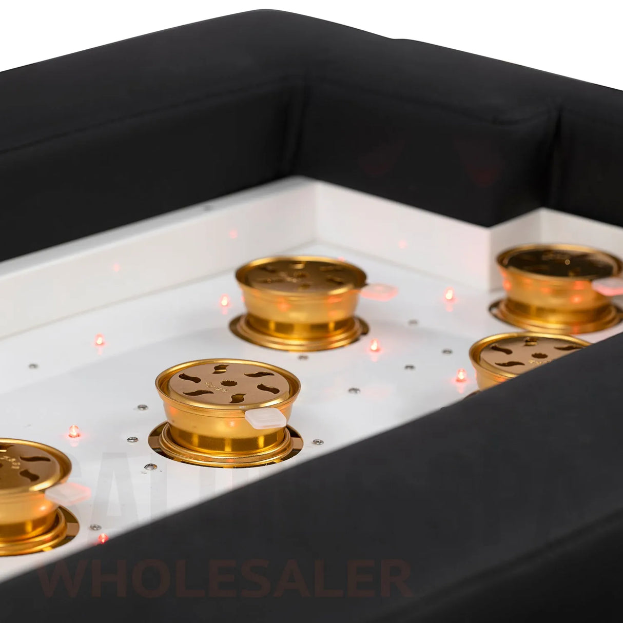 Detail image of the moxibustion cups on the black SSW 611-2 Japanese Head Spa Massage Bed.