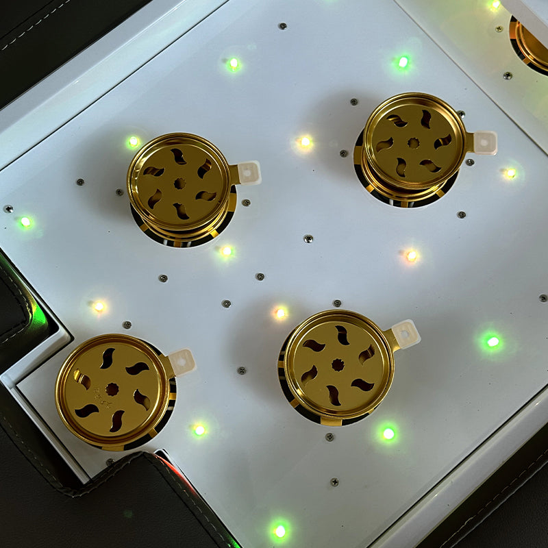 Detail image of the moxibustion cups on the black SSW 611-2D Fresh Water Japanese Head Spa Massage Bed.