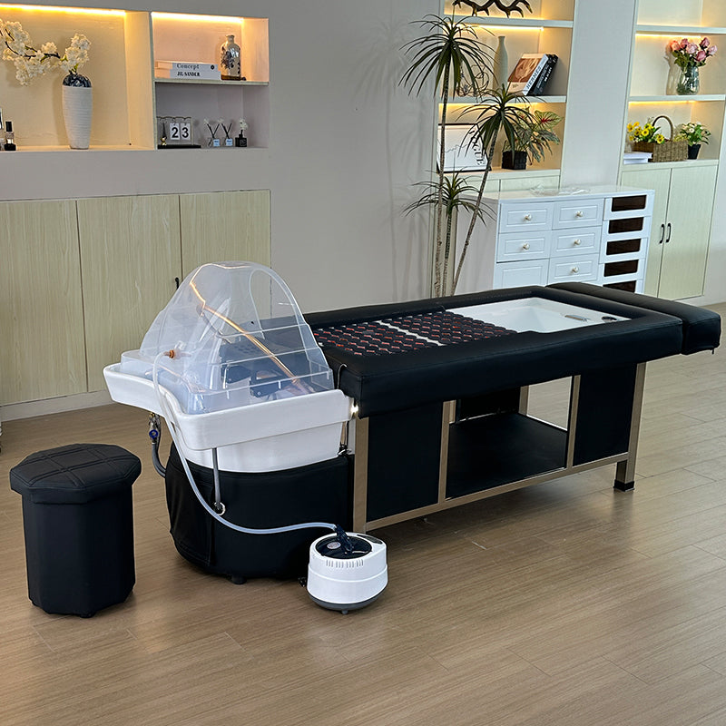 Lifestyle image of the black SSW 611-4D Fresh Water Japanese Head Spa Massage Bed