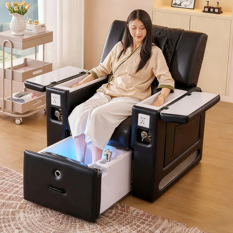 Woman using a SSW M30 Manicure-Pedicure Chair in salon setting.