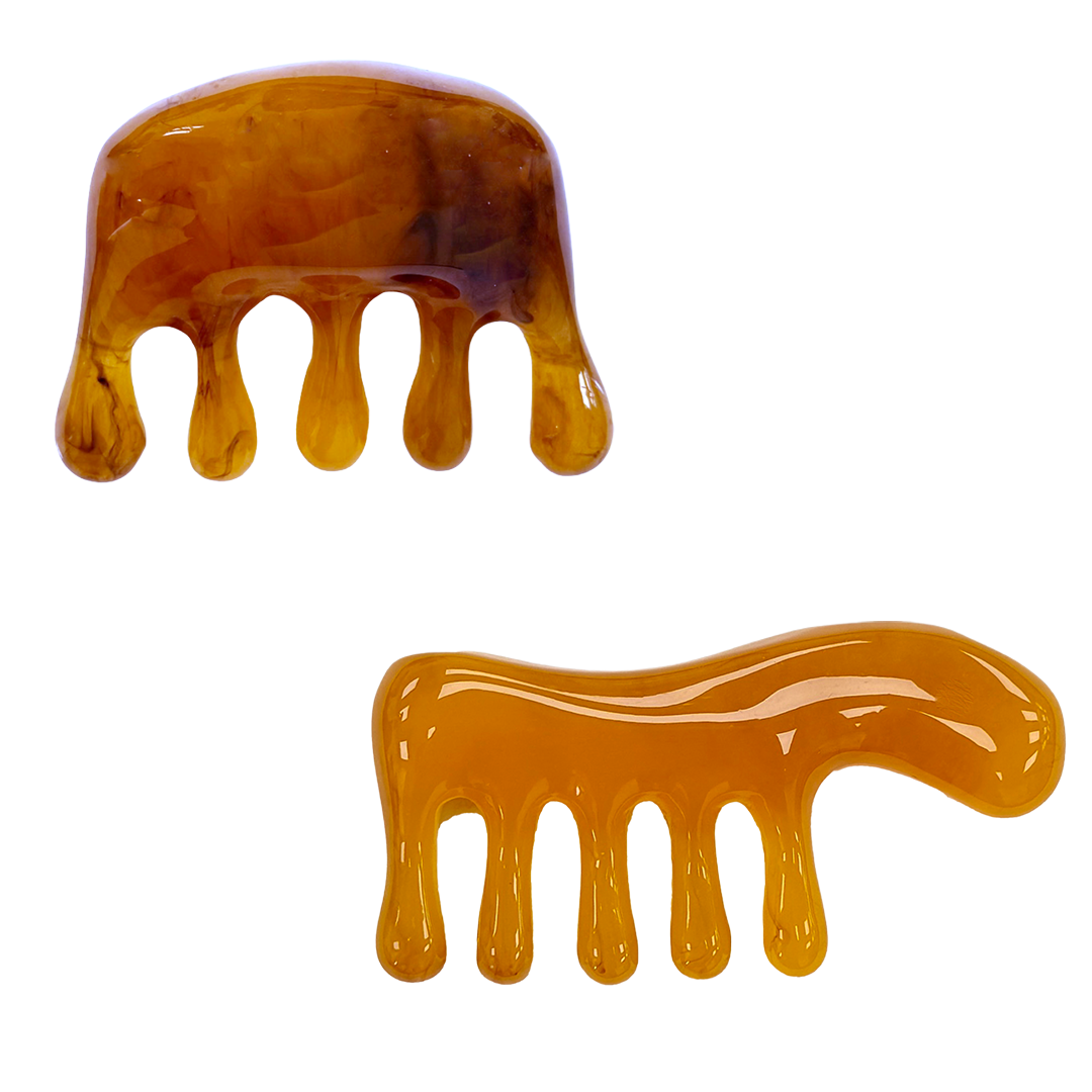 Main image of the resin SSW Gua Sha and Scalp Massagers.