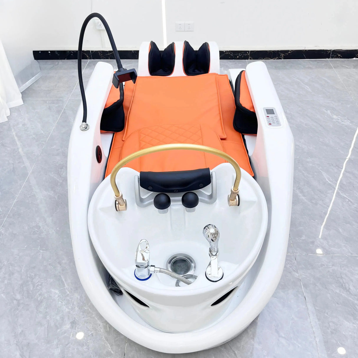 Long view of the orange SSW XL780 Japanese Head Spa Massage Bed