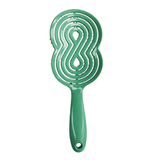 Rear image of the green AVYO Flexible Detangling Hairbrush.