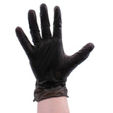 Model wears Colortrak Black Vinyl Glove. 