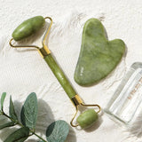 Close-up of the Jade Roller highlighting its smooth, polished surface.