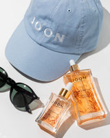 JOON cap with sunglasses and other JOON products.