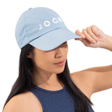 Model wears JOON cap.