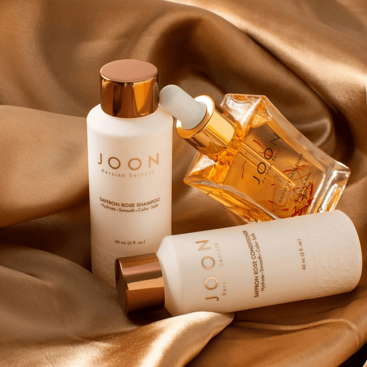 Image of the Joon Saffron Rose Hydrating Set in a luxurious setting. 