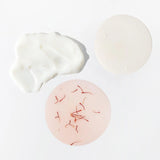 Detail image showcasing the Joon Saffron Rose Hydrating Set's texture. 