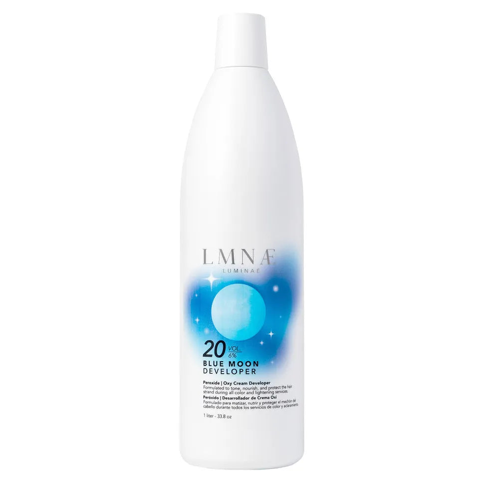 Luminae Blue Moon Premium Developer 20 Volume (6% Peroxide) 1000 milliliter bottle featuring blue-violet toning formula for gentle, effective lift.