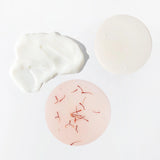 Detail image of JOON shampoo, conditioner, and hair oil textures. 