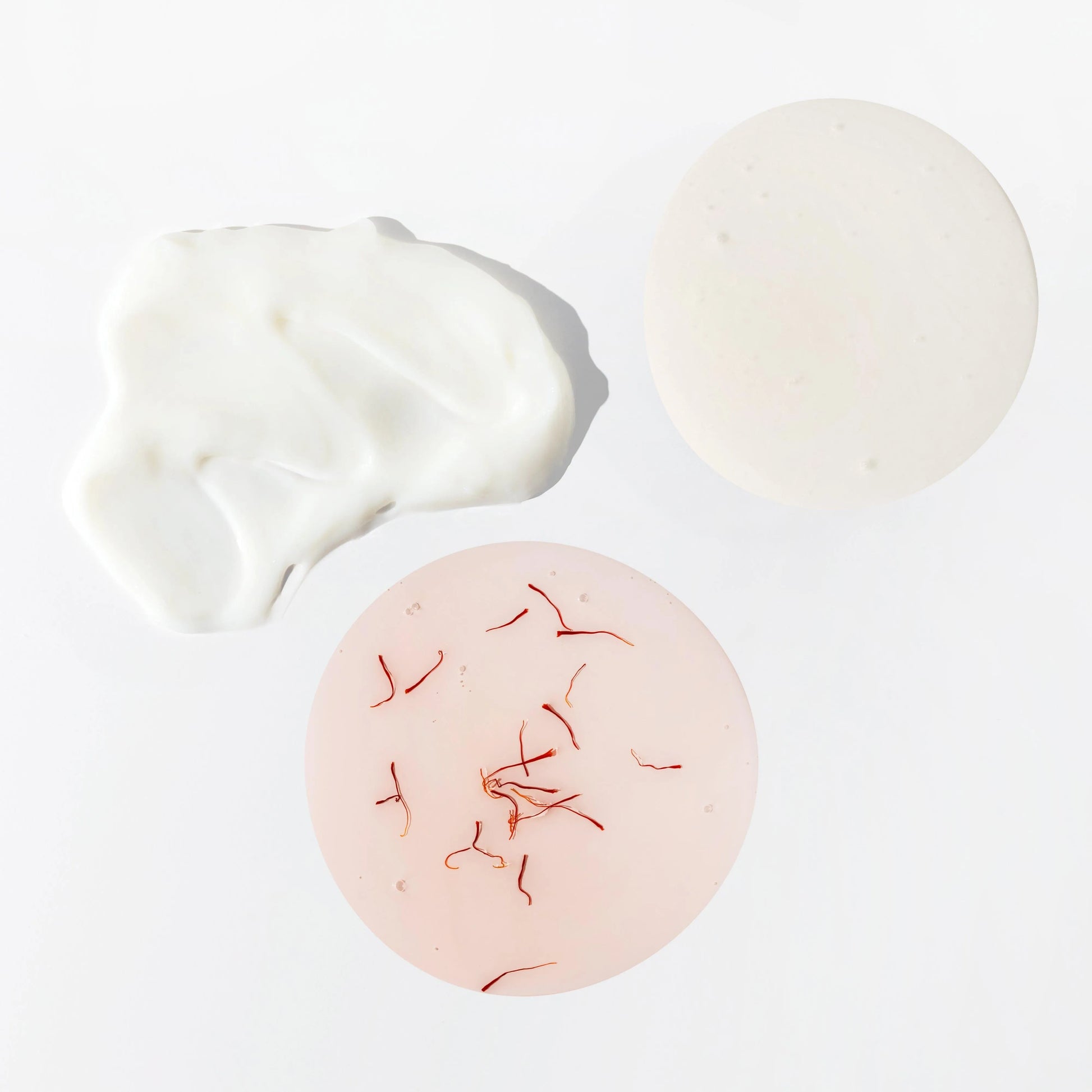 Detail image of JOON shampoo, conditioner, and hair oil textures. 