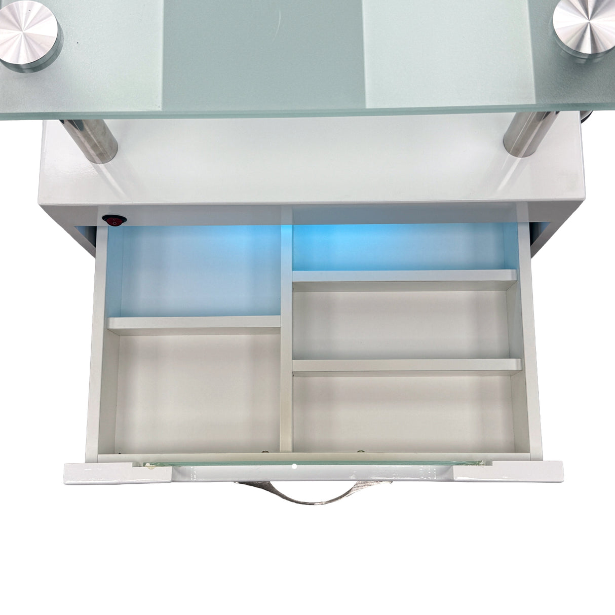 Detail image of the top drawer featuring organizational storage.
