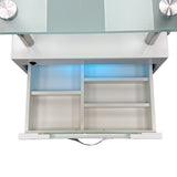 Detail image of the top drawer featuring organizational storage.
