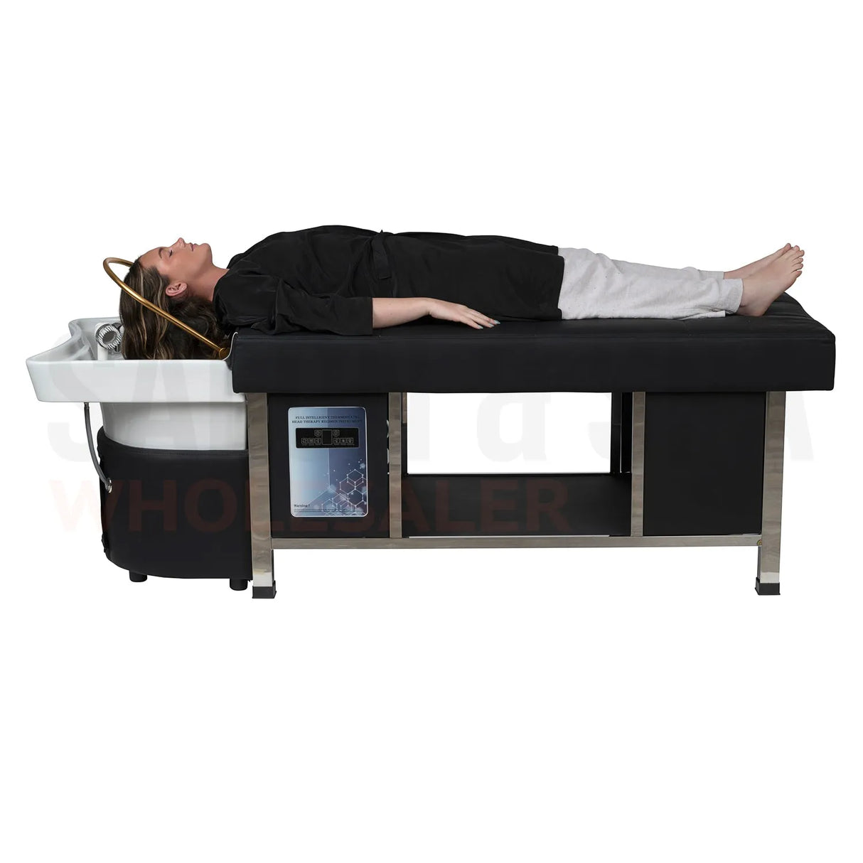 Profile view of a model on the black SSW 611-1NM Japanese Head Spa Massage Bed. 