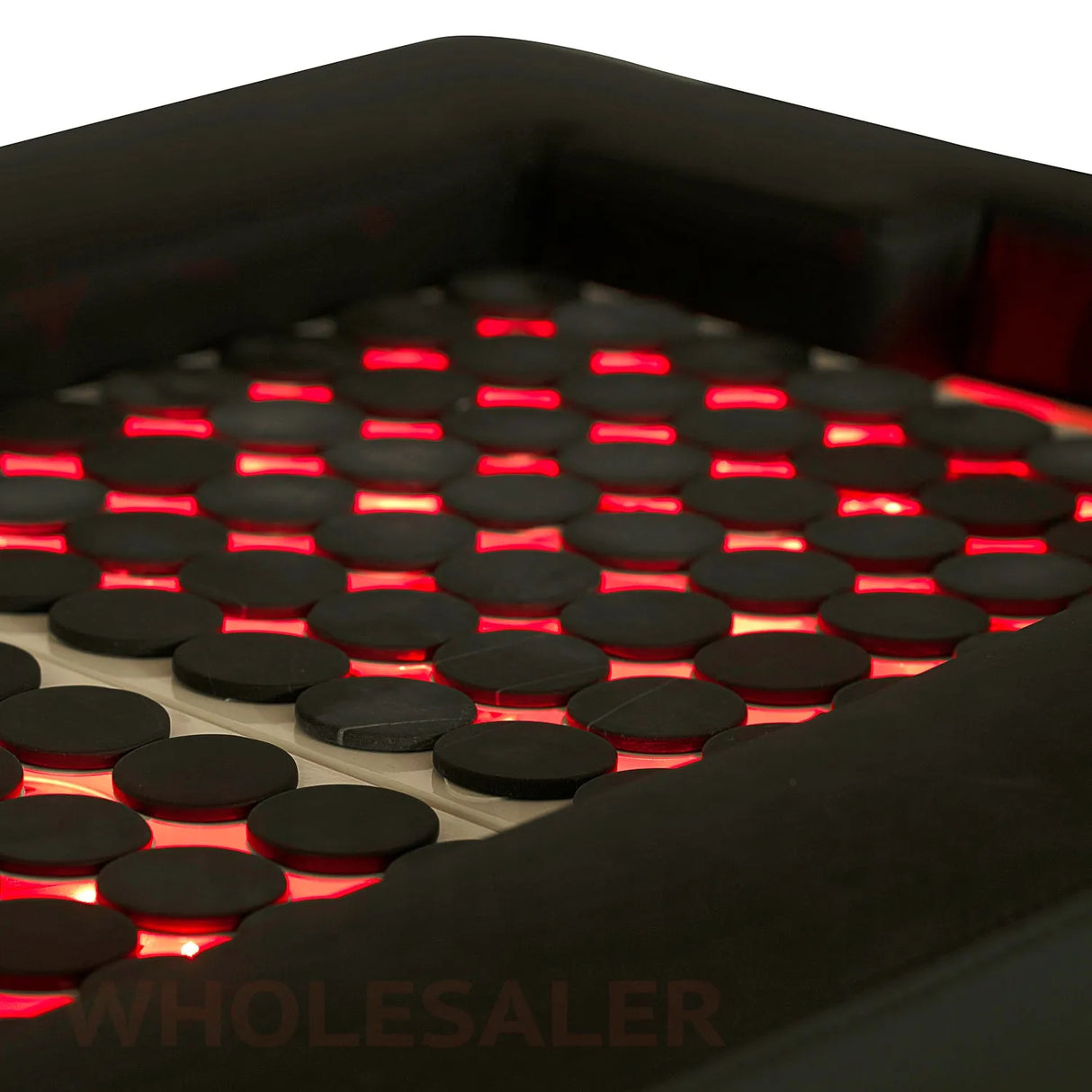 Detail image of the red LED lights on the  black SSW 611-2 Japanese Head Spa Massage Bed. 