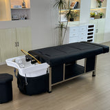 Lifestyle image of the black SSW 611-2D Fresh Water Japanese Head Spa Massage Bed in a salon.
