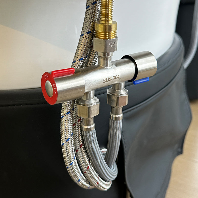 Detail image of the plumbing on the black SSW 611-2D Fresh Water Japanese Head Spa Massage Bed. 