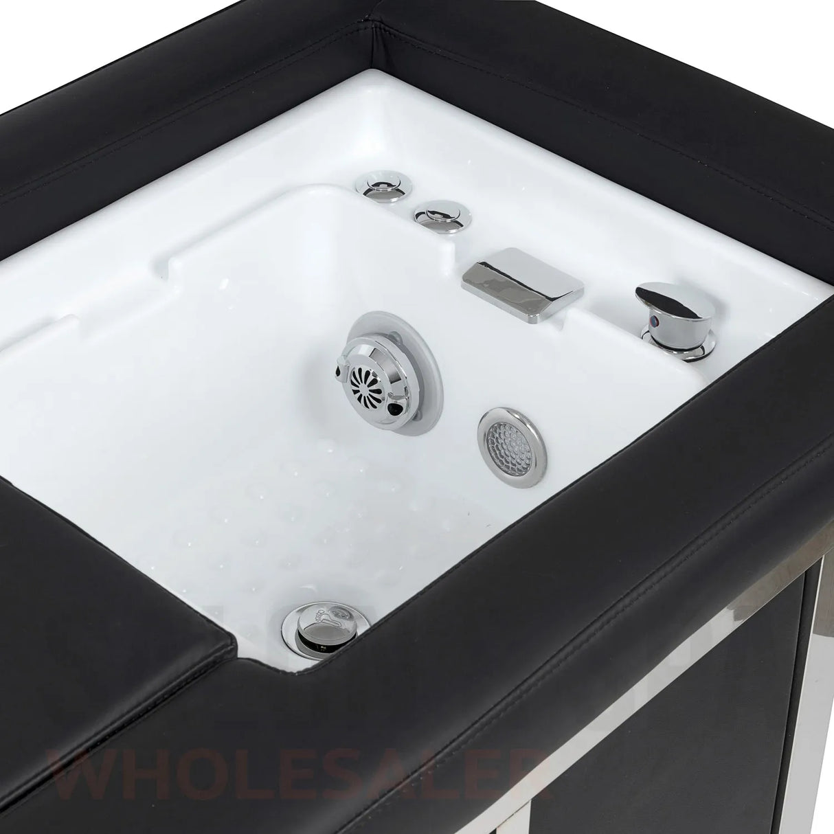 Detail image of the foot basin on the black SSW 661-4 Head Spa Massage Bed