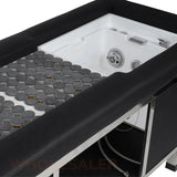 Detail image of the hot stones and foot basin on the black SSW 611-4 Japanese Head Spa Massage Bed. 
