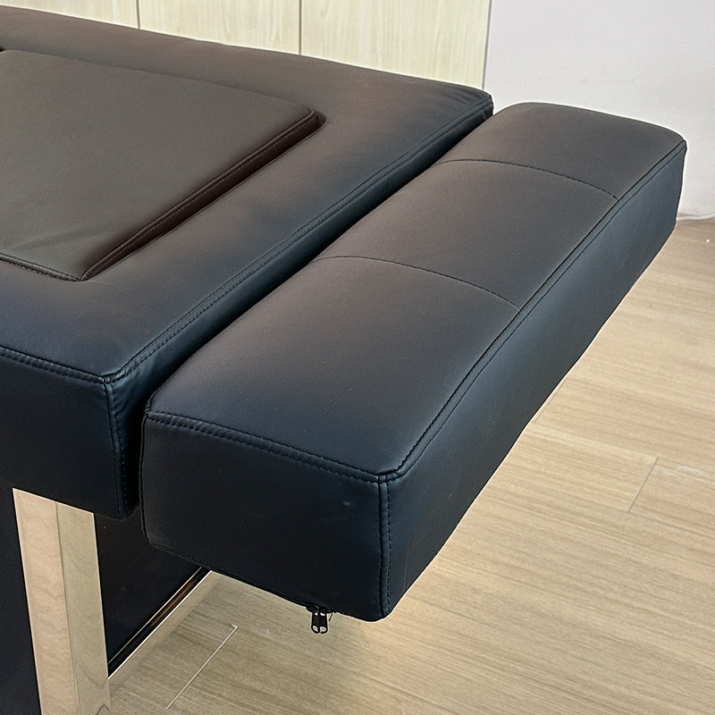 Detail image of the cushioned leg extender on the black SSW 611-4D Fresh Water Japanese Head Spa Massage Bed