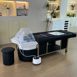 Lifestyle image of the black SSW 611-4D Fresh Water Japanese Head Spa Massage Bed