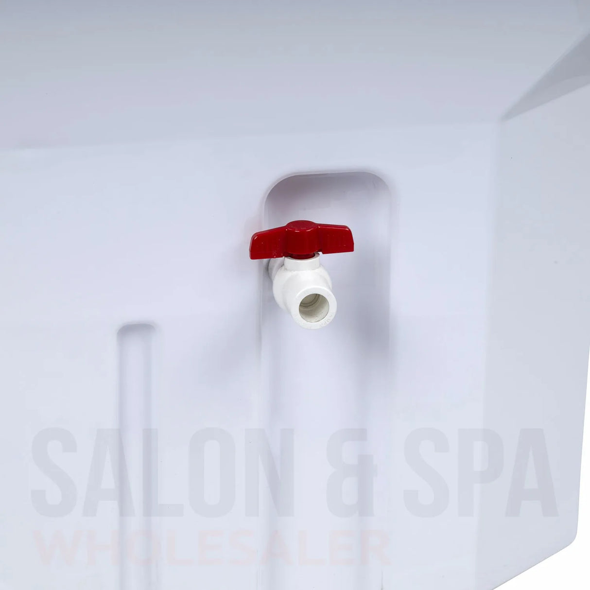 Detail image of the waste water valve on the white SSW 6114P Portable Japanese Head Spa Shampoo Bowl. 