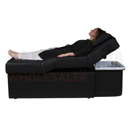 Model on the black SSW 631 Japanese Head Spa Massage Bed. 