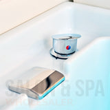 Foot basin faucet detail image on the white SSW 631D Fresh Water Japanese Head Spa Massage Bed. 