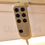 Remote control on the light cream SSW 645D Fresh Water Electric Japanese Head Spa Massage Bed.