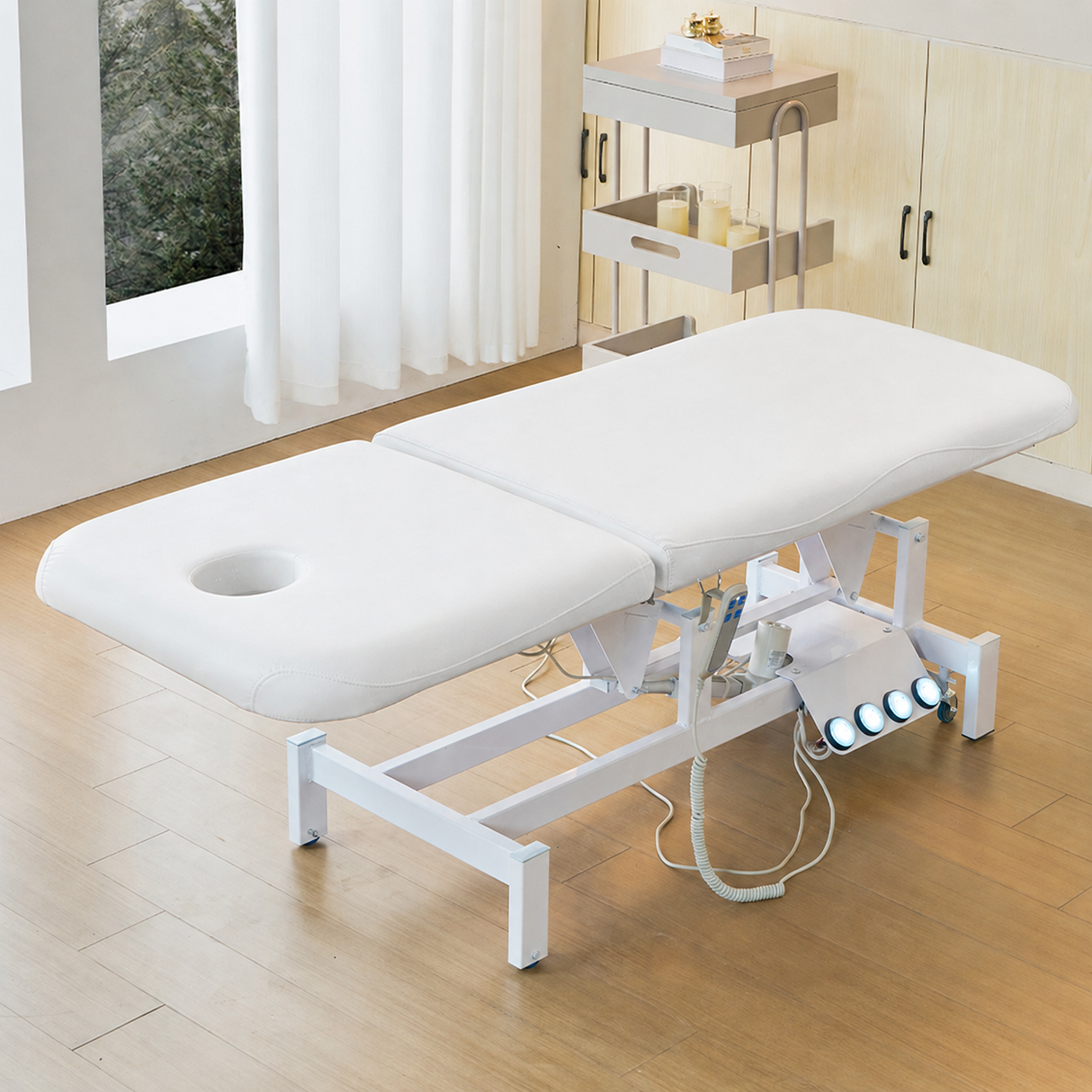 Image shows the white SSW 813 Electric Treatment Table fully extended.