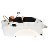 Model on the light cream SSW A035 Japanese Head Spa Massage Bed. 