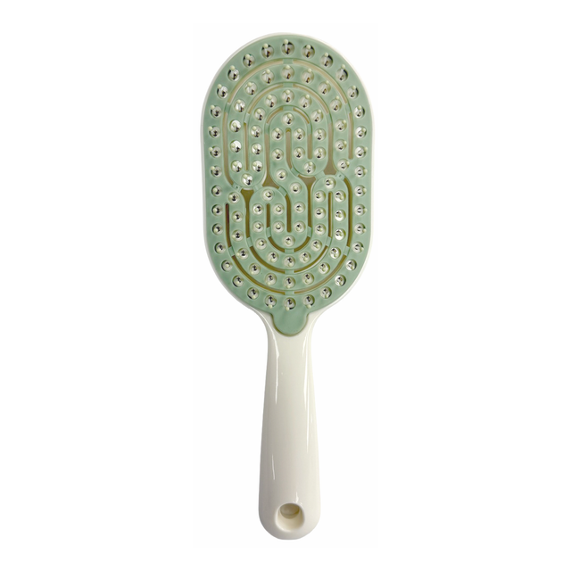 Main image of the ivory and green SSW Flexible Self-Cleaning Detangling Hairbrush.
