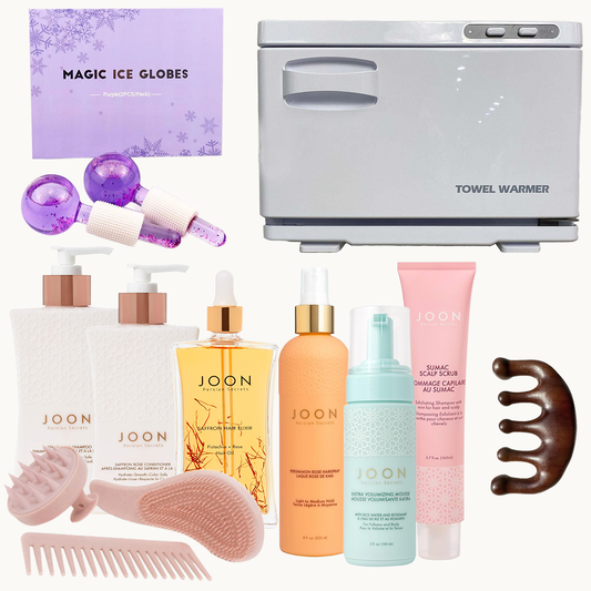 Collection of JOON hair care products and a towel warmer on a white background