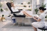 Model receiving treatment on the SSW M35 Electric Japanese Head Spa Massage Bed