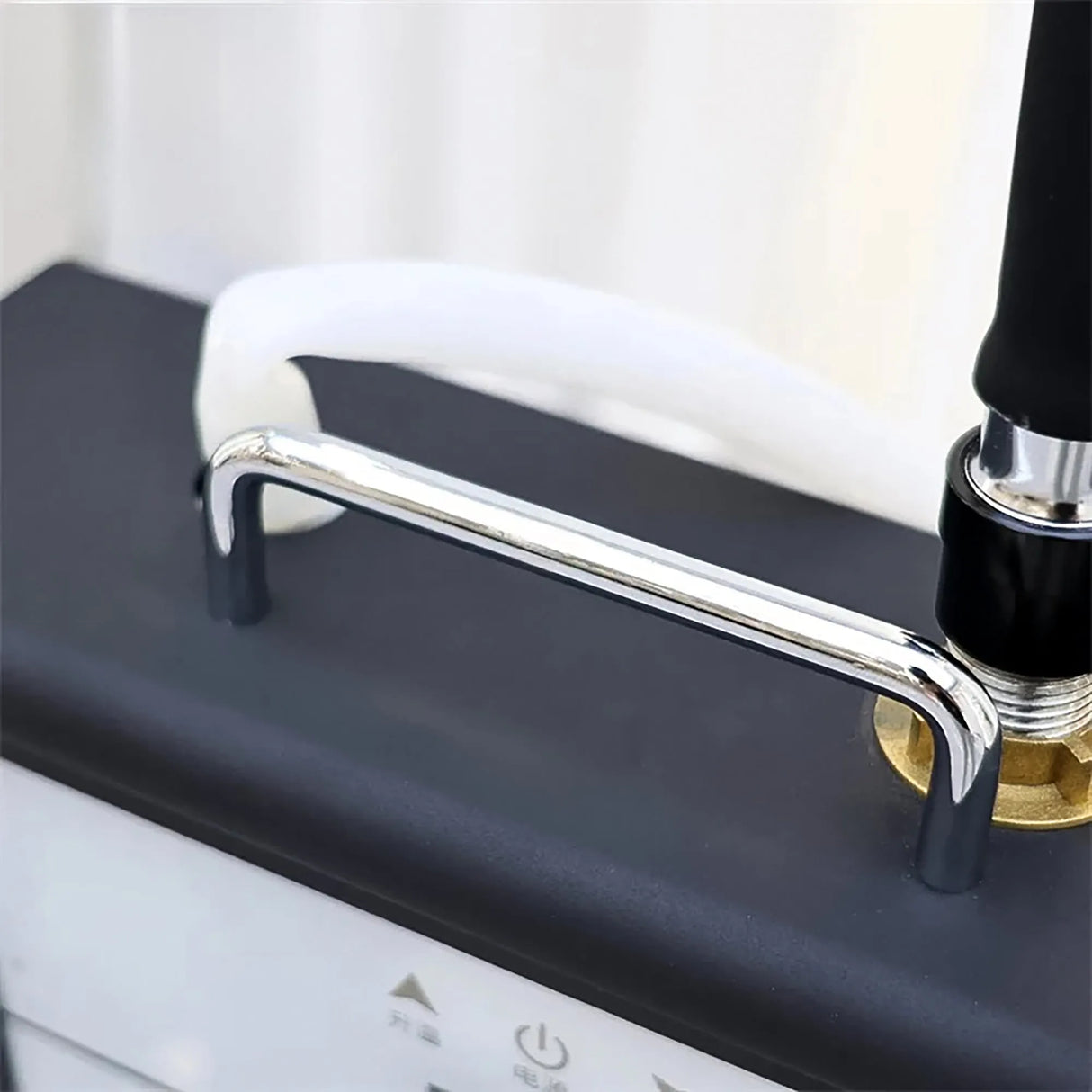 Detail image of the handle on the SSW Raine Freestanding Head Spa Conversion Cart for easy portability. 