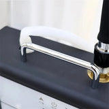 Detail image of the handle on the SSW Raine Freestanding Head Spa Conversion Cart for easy portability. 