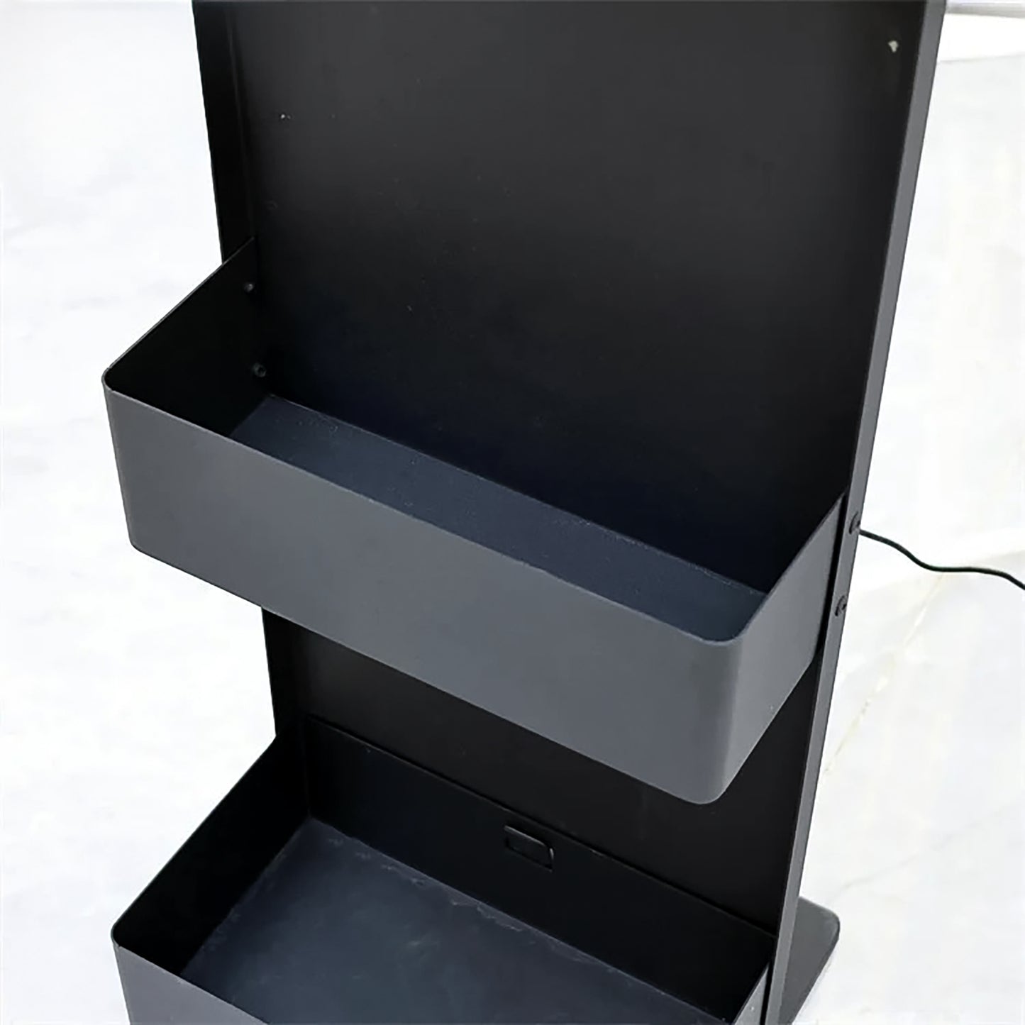 Detail image of the storage compartments on the SSW Raine Freestanding Head Spa Conversion Cart. 