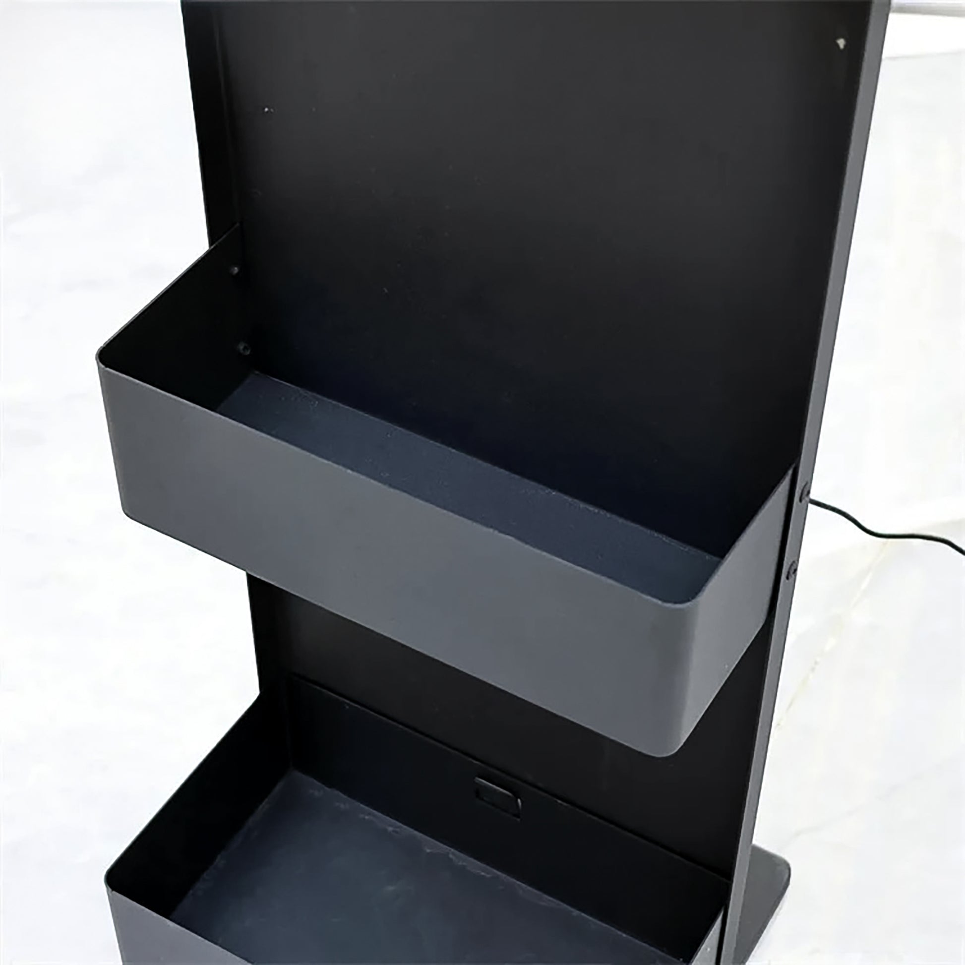Detail image of the storage compartments on the SSW Raine Freestanding Head Spa Conversion Cart. 