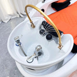 Detail image of the sink on the orange SSW XL780 Japanese Head Spa Massage Bed
